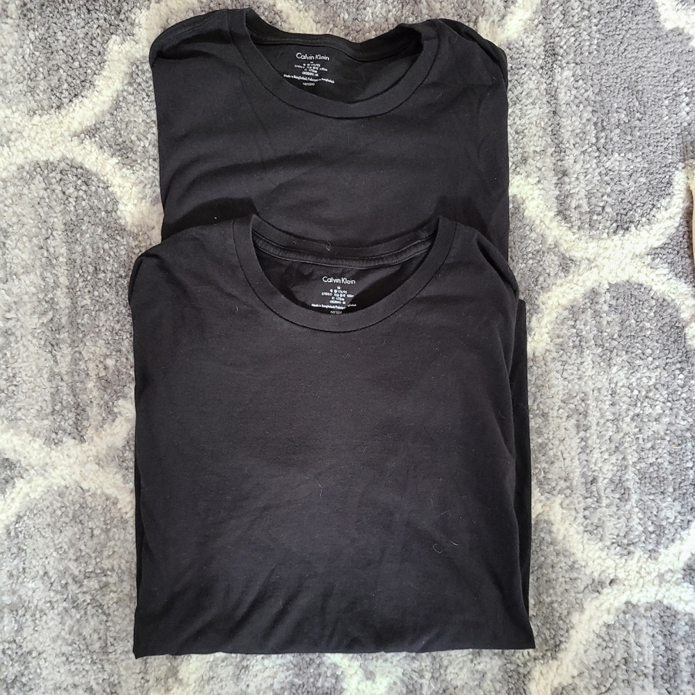 2 black Calvin Klein tshirts
